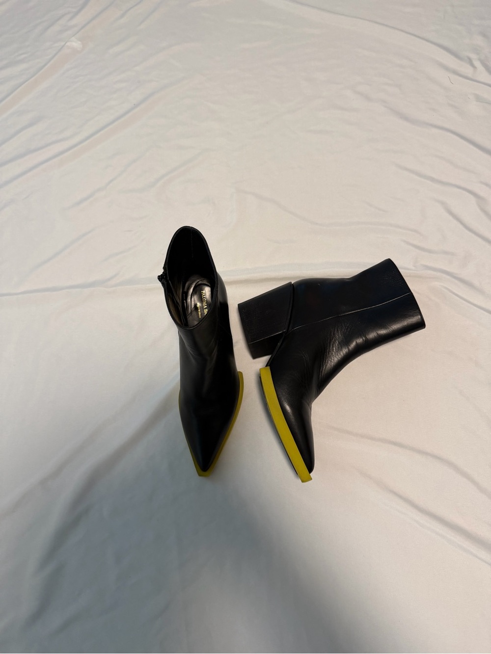 Paloma Barcelo Black Leather Pointed Ankle Boots with Yellow Trim